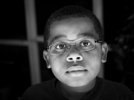 Pediatric optometrists say an eye exam and a pair of glasses can make a dramatic difference in a child's academic performance. (Sir Leto/Flickr)