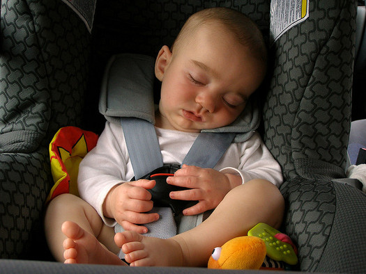 Numerous smartphone apps are available that will alert parents to check their back seats before exiting their vehicle. (Jim Champion/Flickr)