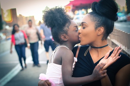 A new report finds that young parents of color face additional challenges as they work to raise their children and stay ahead financially. (Max Pixel)