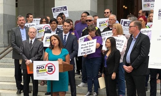 SEIU California Executive Director Alma Hernandez spoke at a rally at the Capitol on Wednesday in opposition to Prop 5. (Rachel Linn Gish/Health Access)