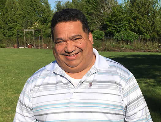 Renato Quintero, a janitor in Hillsboro, Ore., says he wants to get along with everyone. He's worried he could be stopped and questioned more often by police if Measure 105 passes. (SEIU Local 49)