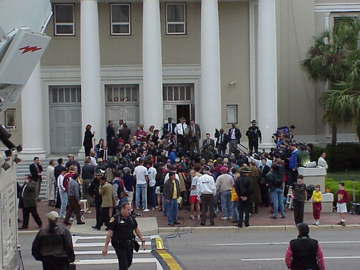A press conference outside the Florida Supreme Court during the recount in the 2000 presidential election. (Village Square/Flickr) 