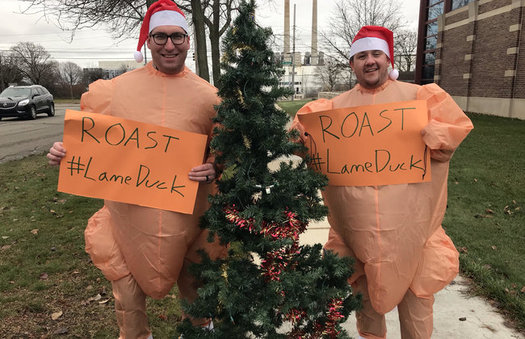 Groups rallying against big changes during the lame-duck legislative session made their point at a rally in front of the Michigan Chamber of Commerce on Monday. (Sam Inglot/Progress Michigan)