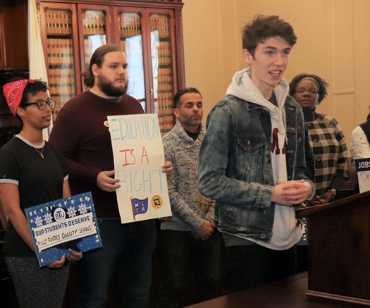 UMass Amherst Student Government Association President Timmy Sullivan speaks at the Fund Our Future Campaign rally at the Massachusetts Statehouse. (Massachusetts Teachers Assn.)