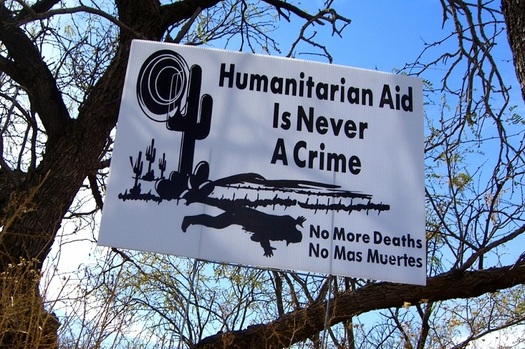 The group No More Deaths supported has posted banners near the Cabeza Prieta refuge supporting the group's efforts to provide aid to migrants. (Flickr)