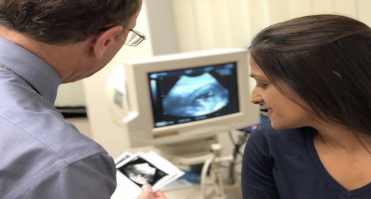 The proposed work-reporting requirement would affect families with annual incomes below $21,000. Opponents say that's primarily parents and caregivers. (Bobbylove/Twenty20)