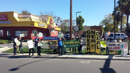 Picketers in San Diego campaigned for the Green New Deal near the office of Rep. Duncan Hunter. (Raghavan 