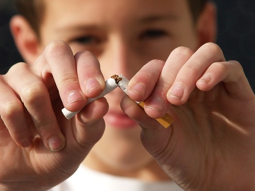 Experts say a majority of adult smokers picked up the habit before age 21. (Hans Martin Paul/Pixabay)