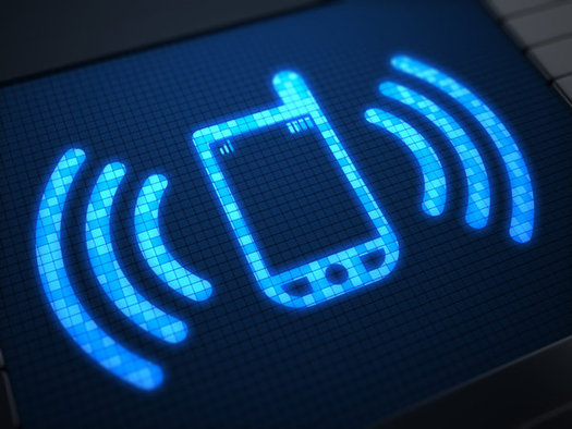 Experts warn against holding a tablet in your lap, putting a cell phone to your ear or carrying a device in your pocket. (d3damon/iStockphoto)