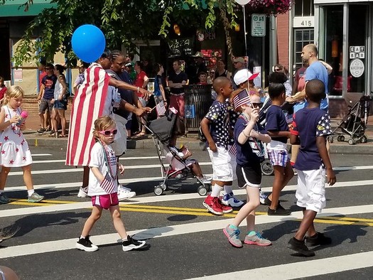 It was more than kids and marching bands at July 4th parades in early presidential nominating states like New Hampshire, as the candidates descended on them to try to make positive impressions on voters. (Mike Licht)