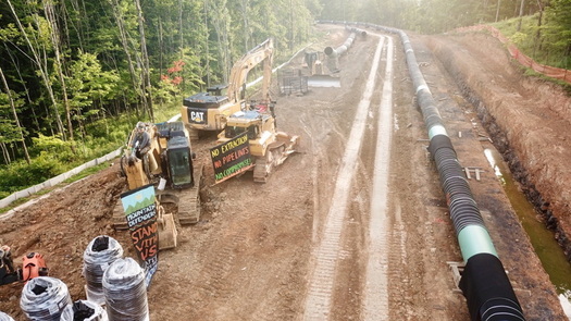 A protester was arrested Wednesday after he locked himself to excavating equipment at this West Virginia site of the Mountain Valley Pipeline. (Appalachians Against Pipelines)