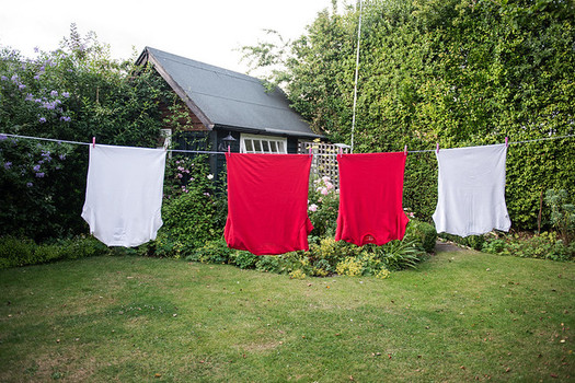 Hang drying clothes is an environmentally friendly alternative to power hungry dryers. (directline.com/Flickr)