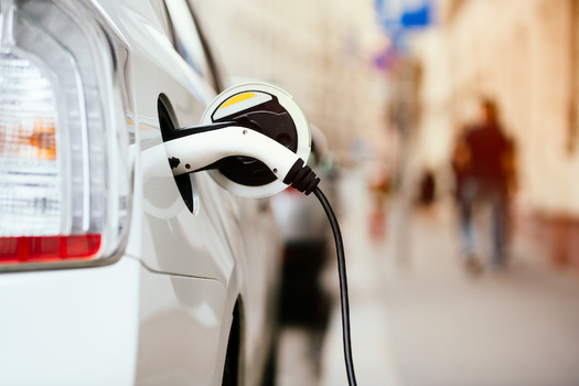 Electrifying passenger vehicles and buses will improve air quality and reduce operating costs for vehicle owners and taxpayers. (baranq/Adobe Stock)