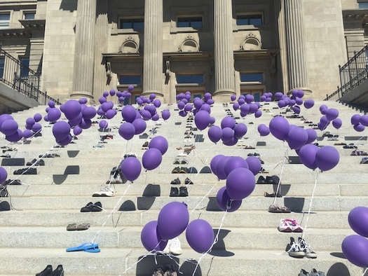 For Overdose Awareness Day, Idahoans place a pair of shoes tied to balloons on the steps of the State Capitol. (Chris Mecham)