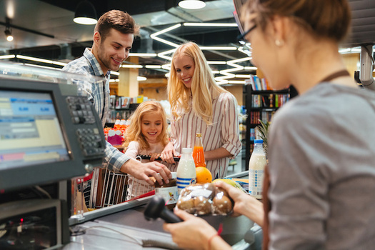 More than 60% of workers at grocery stores are women, according to the Oregon AFL-CIO. (Drobot Dean/Adobe Stock)