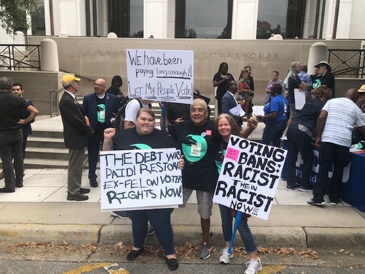 A coalition of Florida organizations rally in Tallahassee as a federal judge hears arguments for and against Senate Bill 7066, which stipulates all fines must be paid before the restoration of voting rights. (Trimmel Gomes)