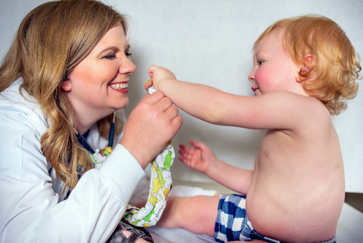 Pediatrician Dr. Crystal Little examines an inquisitive patient at one of Mainline Health Systems' 17 centers in southeast Arkansas. (MainlineHealth)