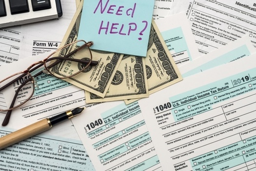 AARP Foundation Tax-Aide counselors helped 65,000 Michigan tax filers receive $28 million in refunds last year. (Adobe Stock) 