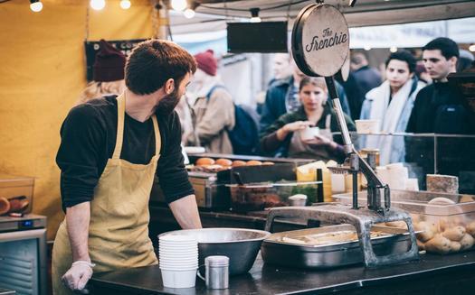 The Minneapolis minimum wage ordinance, which has survived a legal challenge, requires both large and small companies to pay at least $15 an hour by the year 2024. (Clem Onojeghuo/Librestock)