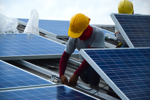 Investing clean-energy dollars in vulnerable communities creates jobs and fights climate change. (surasak/Adobe Stock)