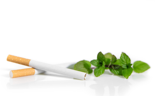 Supporters of a ban on flavored tobacco in Minnesota say menthol cigarettes historically have been used to recruit new smokers, especially in African-American communities. (Adobe Stock)