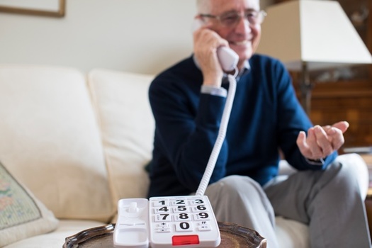 AARP Ohio volunteers are making friendly phone calls to fellow Ohioans who might feel isolated. (Adobe Stock)