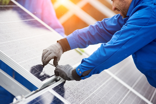 Some of the new solar farms in Virginia are being constructed by a company that the United Nations says has exploited Palestinian natural resources overseas. (Adobe Stock)