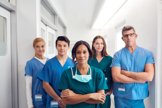 In states like Minnesota, there is need for health care professionals to help fight COVID-19, but hospitals are losing out on other forms of revenue, which has led to staffing cuts. (Adobe Stock)