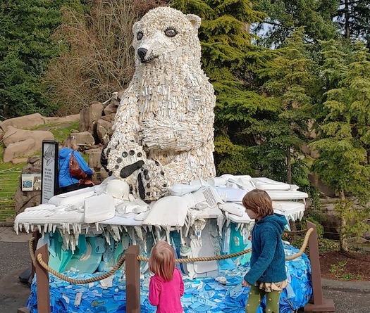 A polar bear sculpture made of trash that's washed up on Oregon beaches is on display at the Oregon Zoo in Portland. (washedashore.org)