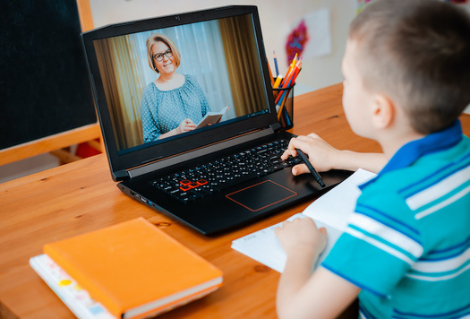 One priority parents mentioned in the education poll is the need to close the digital divide, to ensure students have access to computers and the internet. (shangarey/Adobe Stock)