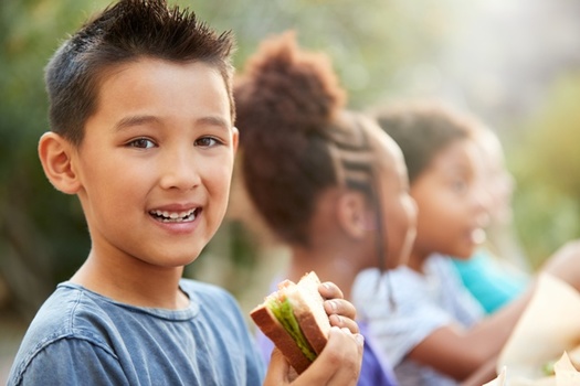 Summer meal sites help fill the gap for children in need of food when school isn't in session, and the pandemic won't change that this summer in Illinois. (Adobe Stock)