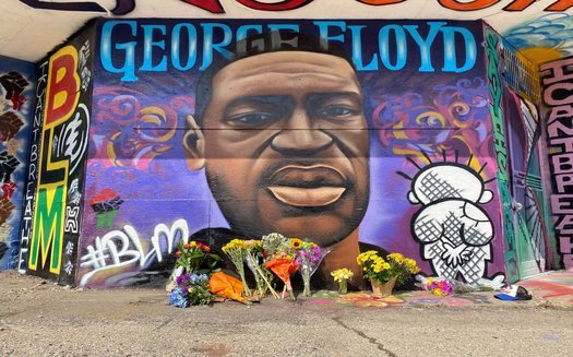 George Floyd murals, such as this one in Milwaukee, have surfaced across the globe following protests over his killing by Minneapolis police. (Graham Kilmer)