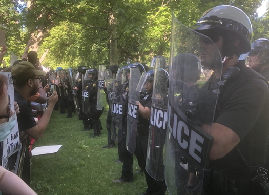 Demonstrators in Lafayette Park, across the street from the White House, square off against riot police on Tuesday. (Courtesy of Brandy Boyce)