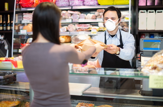The United Food and Commercial Workers estimated that more than 9,000 grocery store workers in the United States were infected with the coronavirus as of May. (Adobe stock)