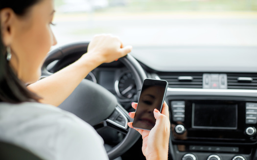 South Dakota's Department of Public Safety says 827 crashes across the state last year were attributed to distracted driving with an electronic device. (Adobe Stock)