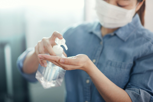 The Washington state Department of Health and Human Services advises home-care workers to use hand sanitizer and wash their hands frequently. (oatawa/Adobe Stock)