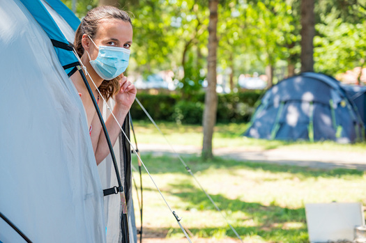 Because COVID-19 spreads through droplets, being outside can help mitigate some of the risks of contracting the virus. (anzebizjan/Adobe Stock)