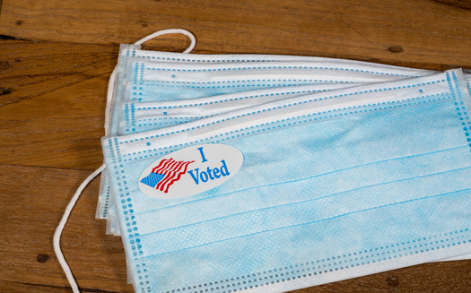 Minnesota's 3,000 polling sites will include safeguards to prevent COVID-19 infection, such as Plexiglas barriers between voters and polling workers. (Adobe Stock)