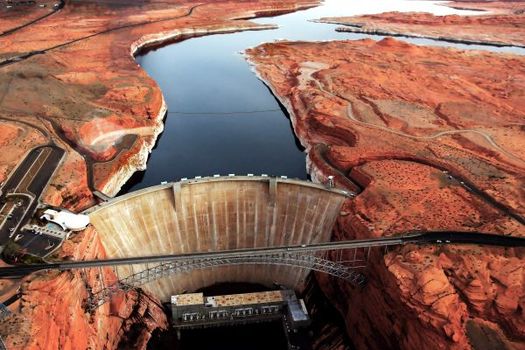 Water from the upper basin of the Colorado River is stored in 186-mile-long Lake Powell along the Utah-Arizona border. (shuvro ghose/Adobe Stock)