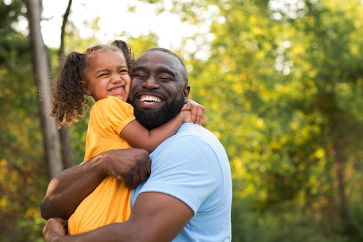 In a new Harvard Graduate School of Education study, more than half of fathers report they're getting to know their children better. (digitalskillet1/Adobe Stock)