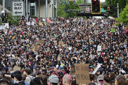 Protesters in Seattle have been in the streets for months now, ever since the police killing of George Floyd in Minneapolis. (Wikimedia Commons)