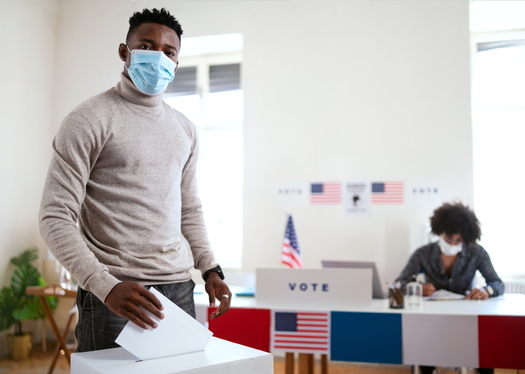 Be prepared for delays when early voting in Baltimore. As a precaution, the city will be checking temperatures at Voting Centers. (Adobe stock)