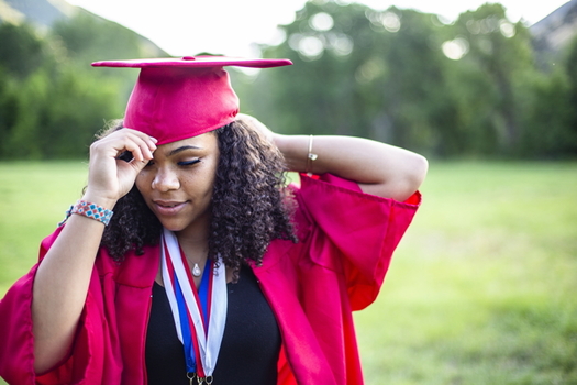 A new report shows that Black women hold almost 50% more student loan debt than white men. (Adobe stock)
