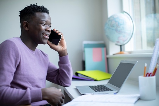Chicago-area high school students are phone-banking from home as part of a get-out-the-vote effort. (Adobe Stock)