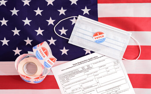 The fall election came amid a coronavirus surge in South Dakota, prompting election offices to keep extra masks handy and have hand-sanitizing stations in place, along with other measures. (Adobe Stock)