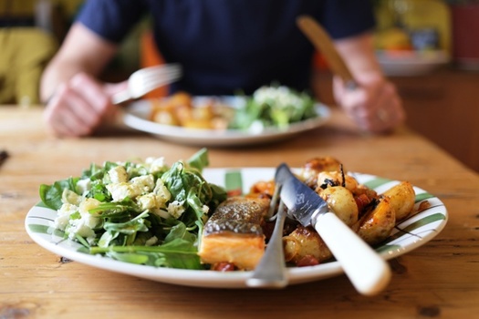 Dieticians say preparing meals at home makes it easier to keep track of added sugars, fats and sodium in your diet. (Adobe Stock)