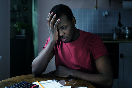 Rally organizers say nearly 30% of Philadelphians with student debt in communities of color are behind on their loan payments. (Damir Khabirov/Adobe Stock)