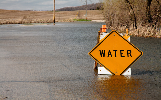 A new Wisconsin report says increases in precipitation and temperatures are likely to drive more extreme weather events, such as floods and heatwaves. (Adobe Stock)