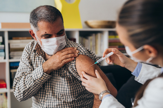 The CDC says flu vaccination reduces the risk of flu illness by between 40% and 60% among the overall population during seasons when most circulating flu viruses are well-matched to the flu vaccine. (Adobe Stock)