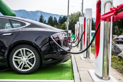 With the Transportation and Climate Initiative, revenue paid by gasoline and oil companies for pollution will help fund clean-power infrastructure such as electric car charging stations. (dandaman/Adobe Stock)